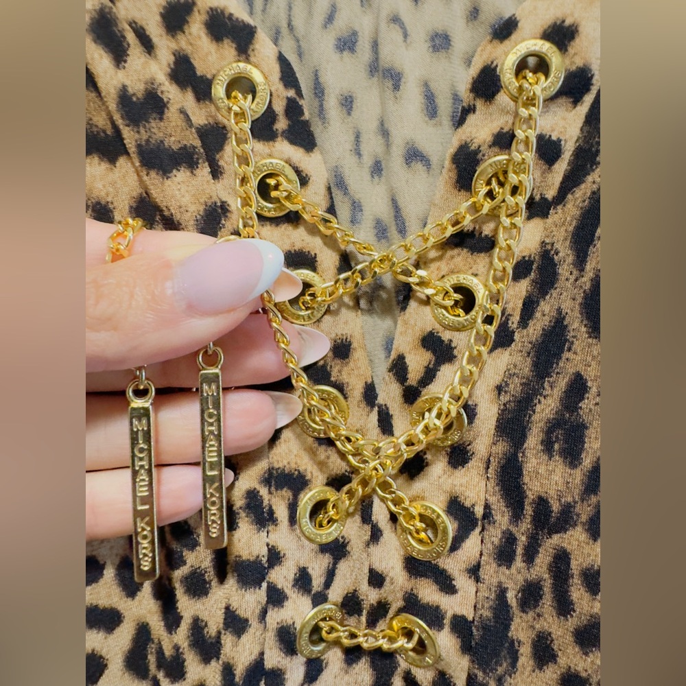 EUC Michael Kors runs big